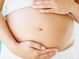 flute player look after the baby